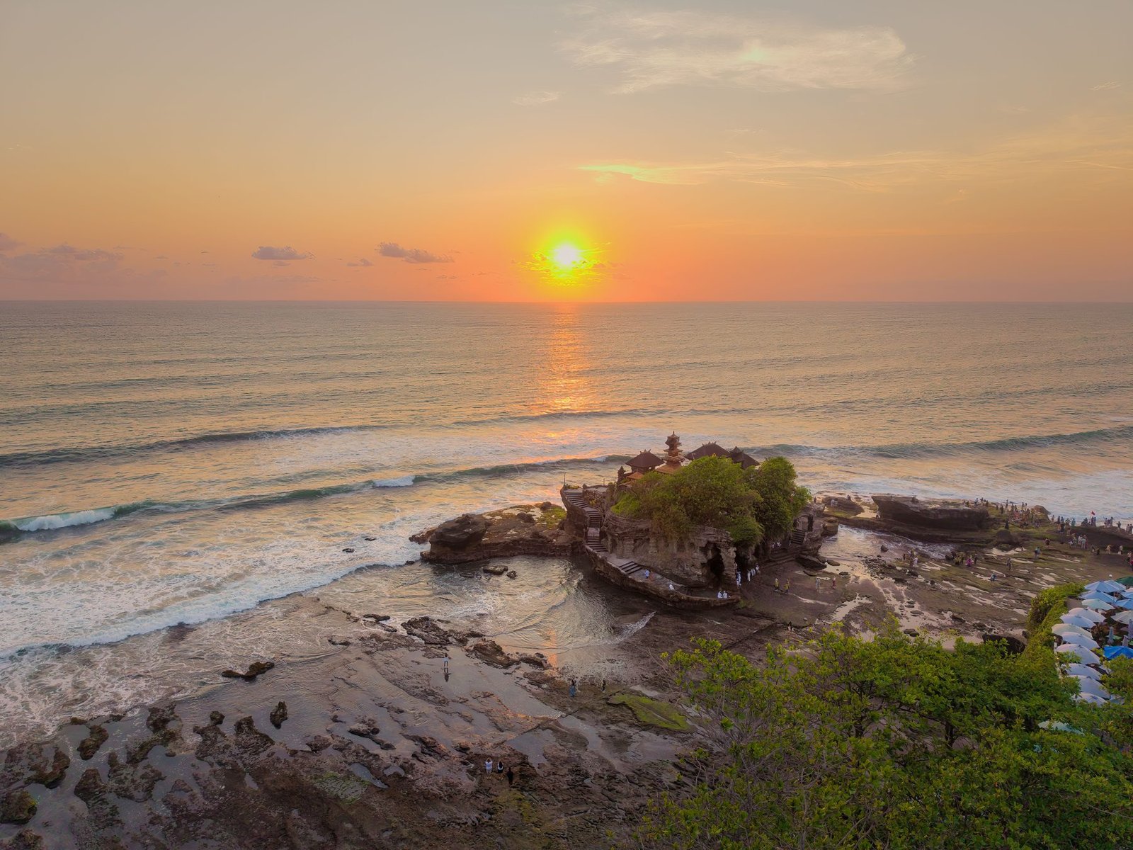 Tanah Lot temple on its rock platform at sunset, Bali